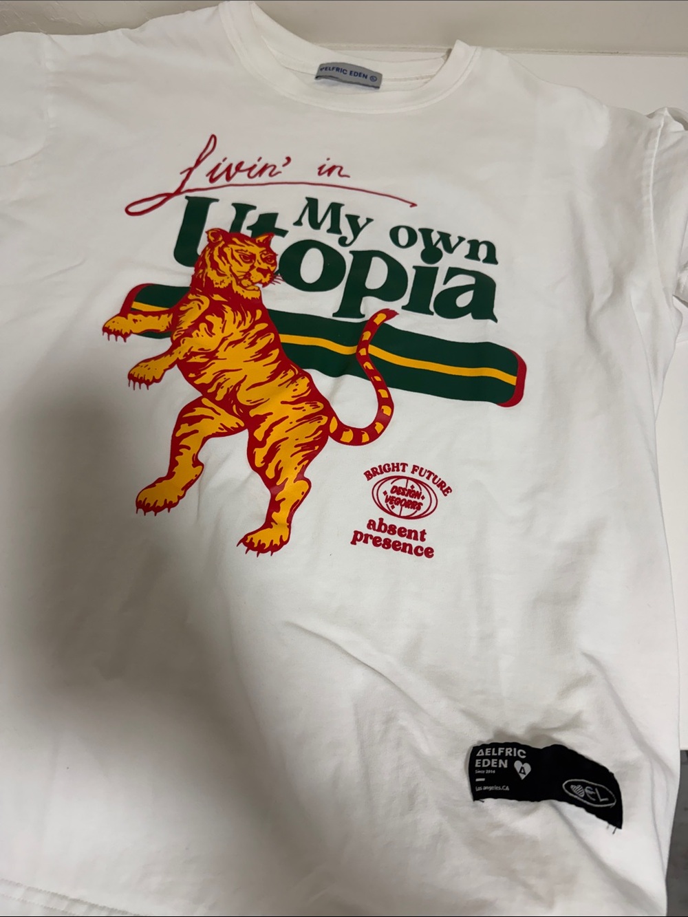 Aelfric Eden  "My Own Utopia" White Graphic Tee with Tiger Print